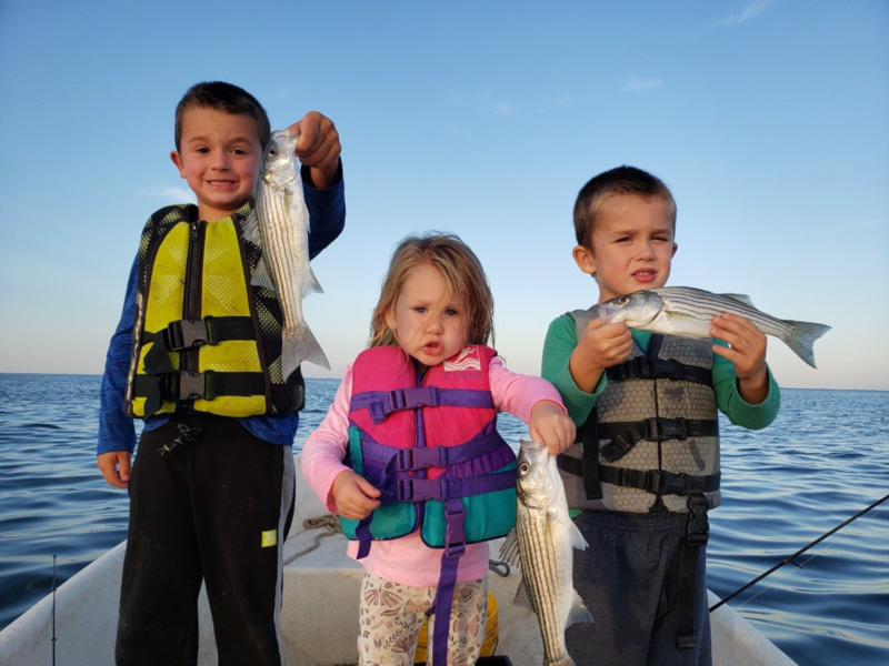 three kids fishing